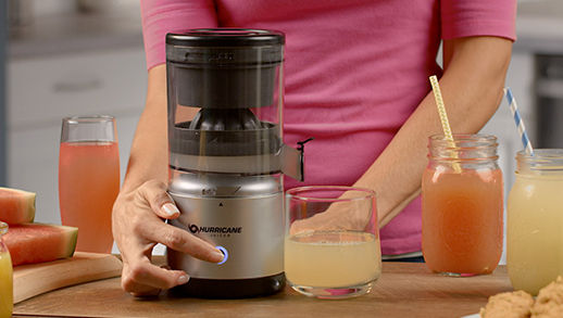 Woman using the HurricaneJuicer to make different juices